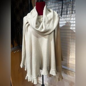 NWOT Beautiful Cream color cowl neck poncho with ruffled bottom